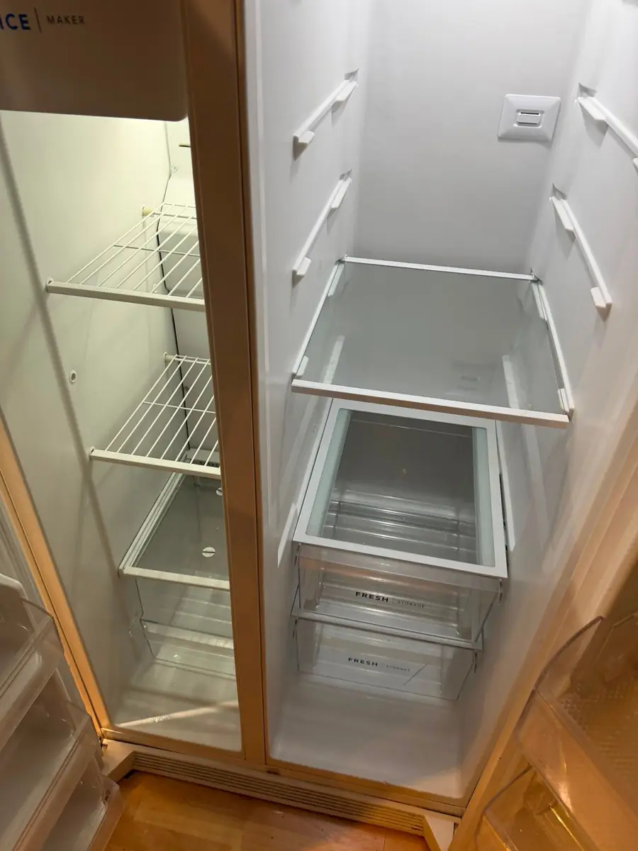 After: spotless refrigerator with clean glass shelves and drawers