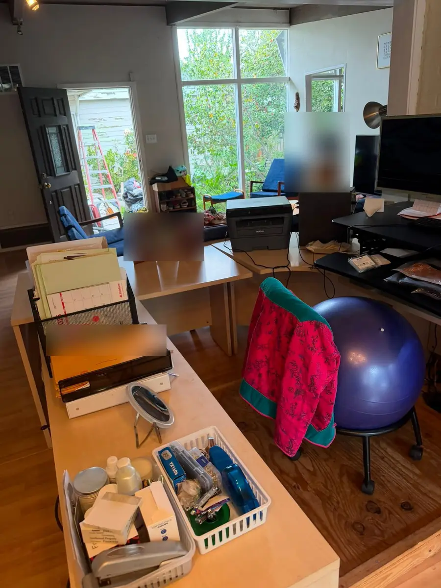 After: organized home office desk with supplies sorted into trays